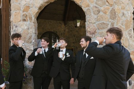 Gavin and his groomsmen sharing a drink before the ceremony.