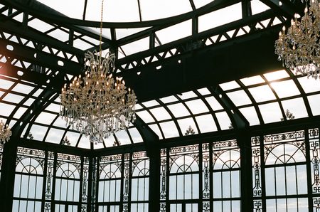 Chandeliers hanging in the glass-roofed conservatory at Stonehaven.